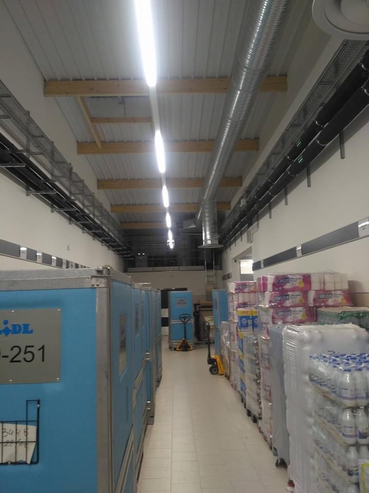 Installation électrique pour enseigne de distribution — réalisation HE2M à Libourne